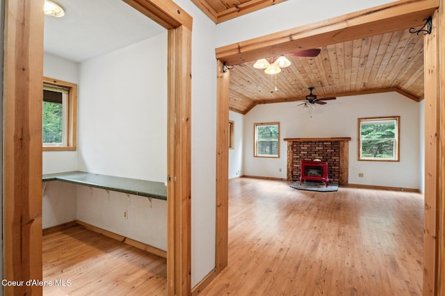 interior space with vaulted ceiling and a wealth of natural light