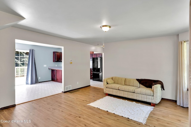 12854 E Hellroaring Rd, Athol, ID 83801 - living room featuring light wood-style flooring and baseboards