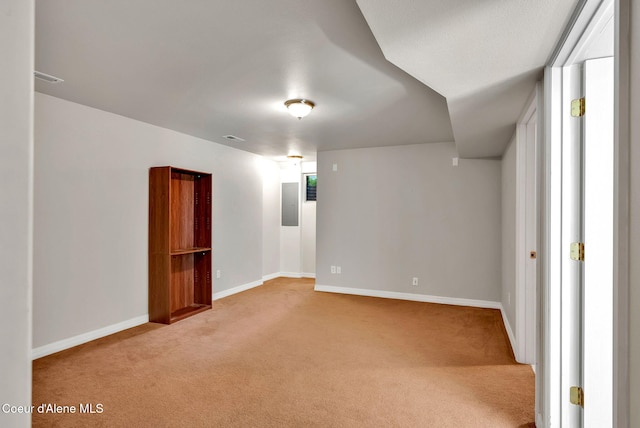 12854 E Hellroaring Rd, Athol, ID 83801 - spare room with light colored carpet and baseboards