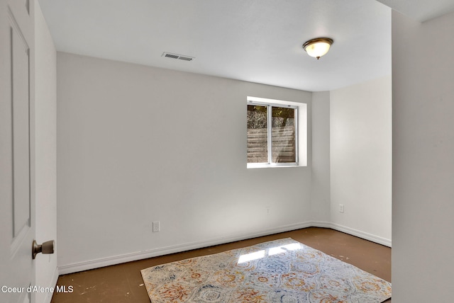 12854 E Hellroaring Rd, Athol, ID 83801 - unfurnished room with baseboards and concrete flooring