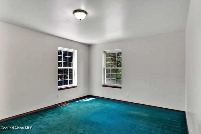 12854 E Hellroaring Rd, Athol, ID 83801 - empty room with carpet flooring and baseboards