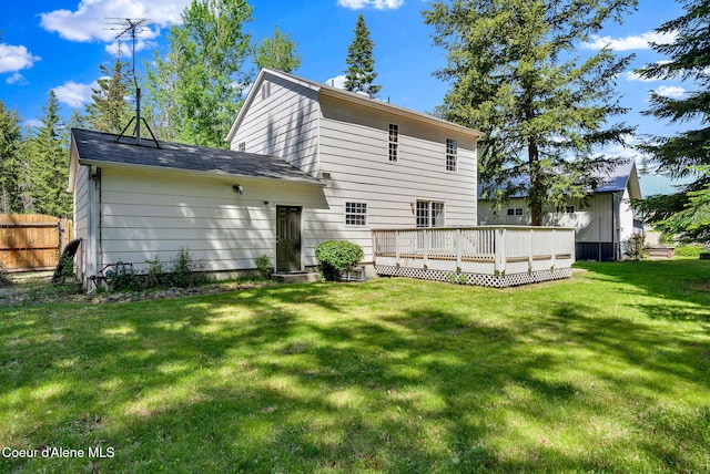 12854 E Hellroaring Rd, Athol, ID 83801 - back of property featuring a wooden deck and roof with shingles