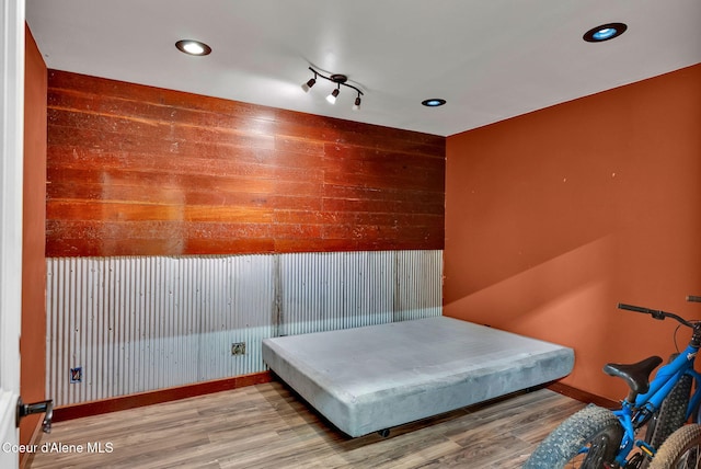 12854 E Hellroaring Rd, Athol, ID 83801 - misc room featuring baseboards, wood finished floors, wooden walls, recessed lighting, and a sauna