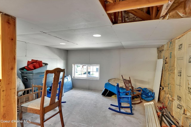 12854 E Hellroaring Rd, Athol, ID 83801 - bedroom featuring unfinished concrete floors and recessed lighting