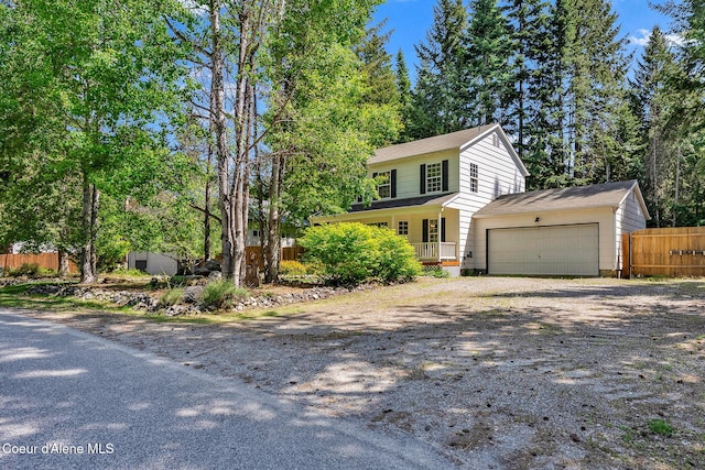 12854 E Hellroaring Rd, Athol, ID 83801 - view of front of home with a garage and dirt driveway