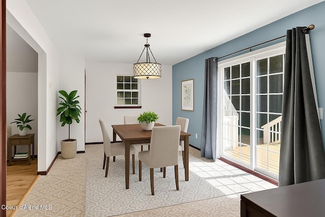 12854 E Hellroaring Rd, Athol, ID 83801 - dining space featuring plenty of natural light and baseboards