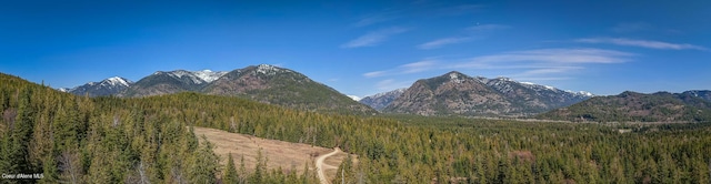 mountain view featuring a view of trees