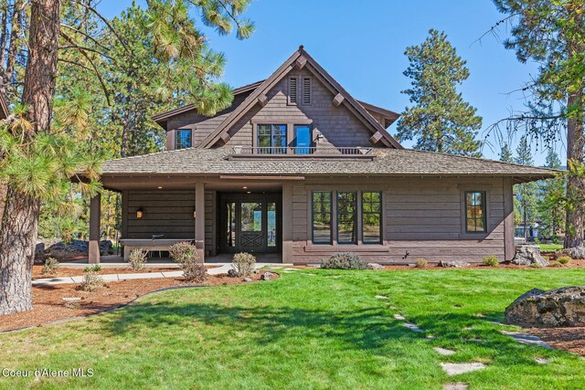 2623 E Old Barn Ct, Harrison, ID 83833 - view of front of house featuring a front lawn
