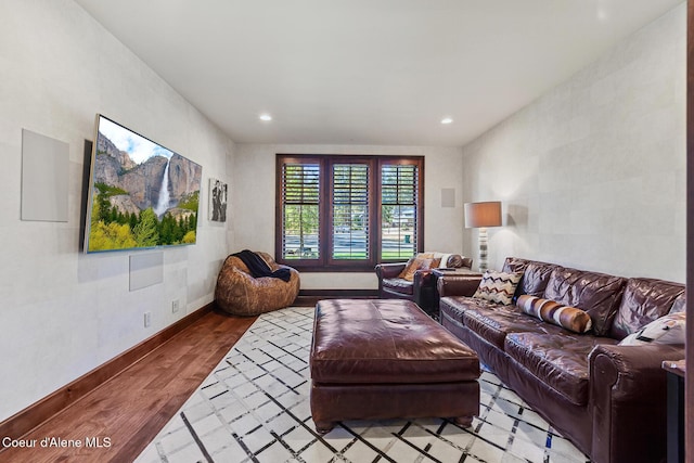 2623 E Old Barn Ct, Harrison, ID 83833 - living area featuring baseboards, wood finished floors, and recessed lighting
