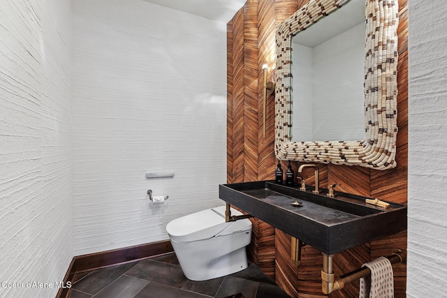 2623 E Old Barn Ct, Harrison, ID 83833 - half bath featuring toilet and tile patterned floors