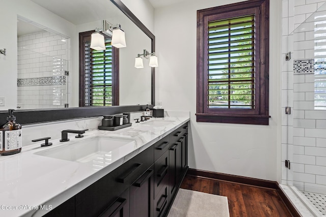 2623 E Old Barn Ct, Harrison, ID 83833 - full bathroom featuring wood finished floors, a sink, plenty of natural light, and a shower stall