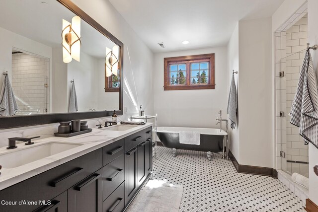 2623 E Old Barn Ct, Harrison, ID 83833 - full bath featuring a stall shower, a sink, a soaking tub, baseboards, and double vanity