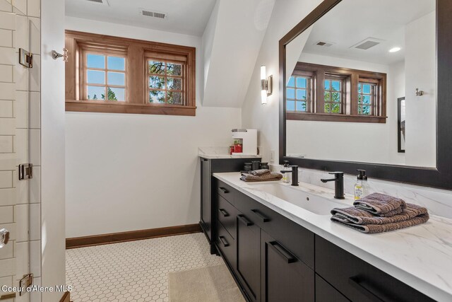 2623 E Old Barn Ct, Harrison, ID 83833 - bathroom with vanity, baseboards, and visible vents