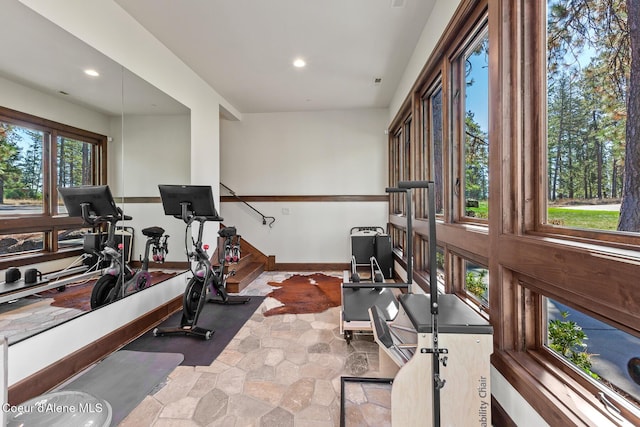 2623 E Old Barn Ct, Harrison, ID 83833 - workout room with stone finish flooring, baseboards, and recessed lighting