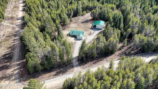 aerial view featuring a view of trees