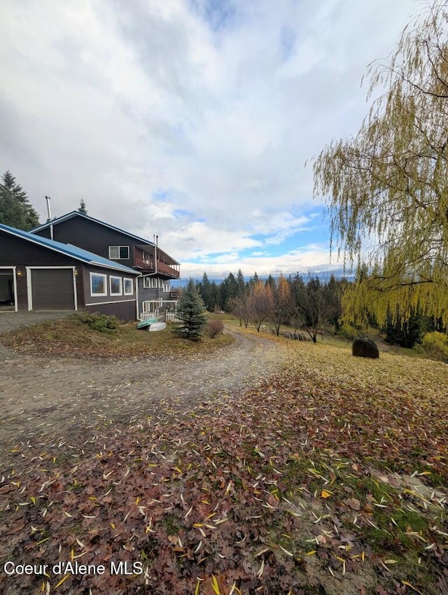 exterior space with an attached garage and driveway