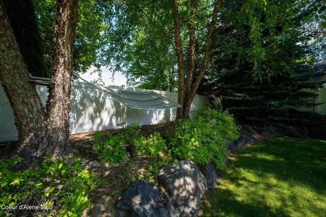 687 E Round Up Cir, Hayden, ID 83835 - view of green lawn