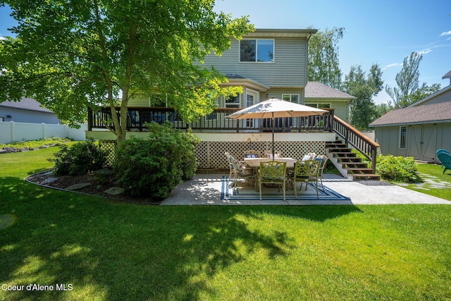 687 E Round Up Cir, Hayden, ID 83835 - rear view of property featuring a patio, a deck, and stairway