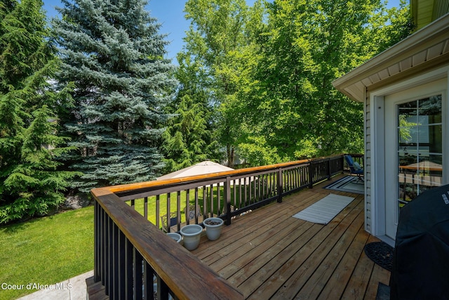 687 E Round Up Cir, Hayden, ID 83835 - deck featuring a yard and grilling area