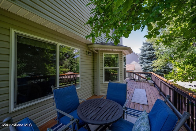 687 E Round Up Cir, Hayden, ID 83835 - wooden terrace featuring outdoor dining space
