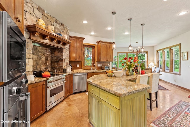 1990 S Gateway Ranch Rd, Coeur Dalene, ID 83814 - kitchen featuring a kitchen bar, light stone countertops, decorative backsplash, a kitchen island, and stainless steel appliances
