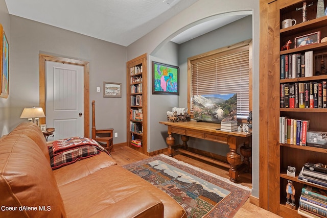 1990 S Gateway Ranch Rd, Coeur Dalene, ID 83814 - office space with baseboards, arched walkways, and wood finished floors