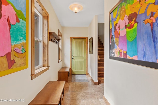 1990 S Gateway Ranch Rd, Coeur Dalene, ID 83814 - corridor with stone finish flooring, stairway, and baseboards