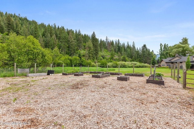 1990 S Gateway Ranch Rd, Coeur Dalene, ID 83814 - view of yard with a vegetable garden and fence