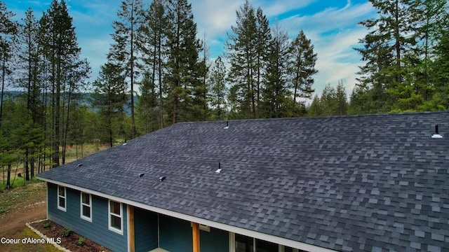 details featuring a shingled roof