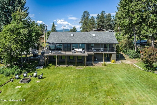 475 Campbell Point Rd, Laclede, ID 83841 - rear view of property with stairway, an outdoor fire pit, a wooden deck, and a yard