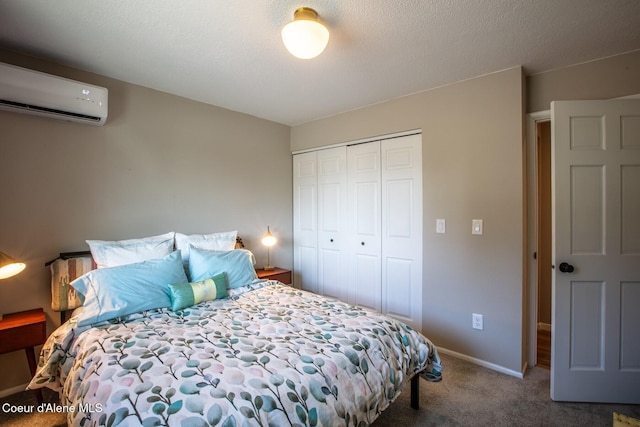 475 Campbell Point Rd, Laclede, ID 83841 - carpeted bedroom with an AC wall unit, a closet, and baseboards