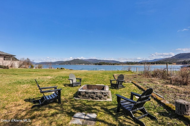 475 Campbell Point Rd, Laclede, ID 83841 - view of grassy yard with a fire pit and a water and mountain view