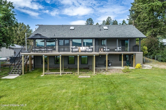 475 Campbell Point Rd, Laclede, ID 83841 - back of property featuring stairs, roof with shingles, a deck, and a patio area