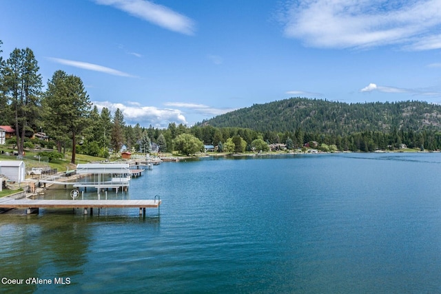 475 Campbell Point Rd, Laclede, ID 83841 - water view featuring a forest, a dock, and mountains