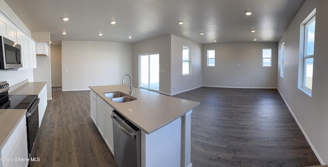 5181 E Aquila Ave, Post Falls, ID 83854 - kitchen featuring recessed lighting, a sink, white cabinetry, and stainless steel appliances