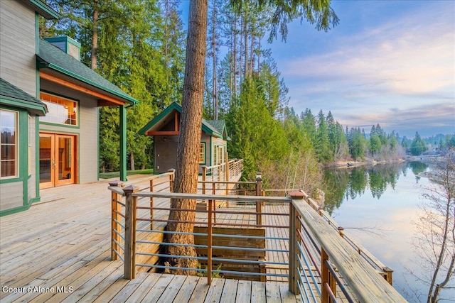 wooden deck with a water view