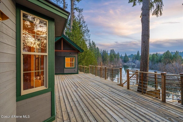 deck at dusk with a water view