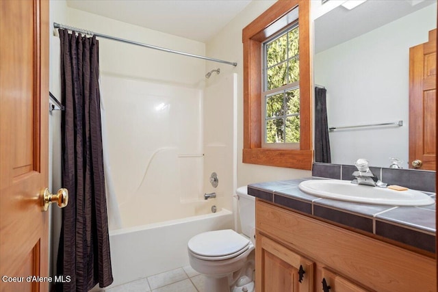 full bathroom featuring shower / bath combo, toilet, tile patterned flooring, and vanity