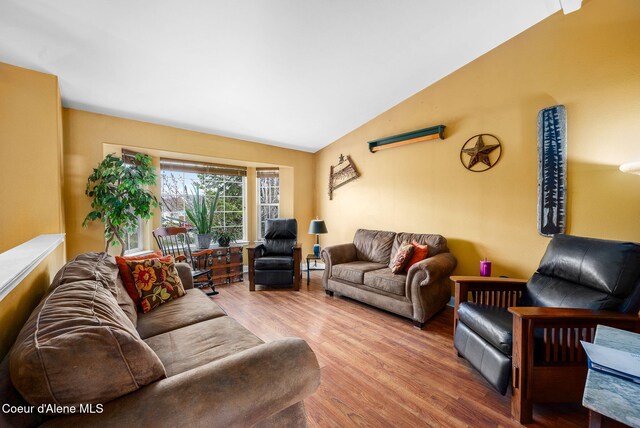 2790 W Versailles Dr, Coeur Dalene, ID 83815 - living area with vaulted ceiling and wood finished floors