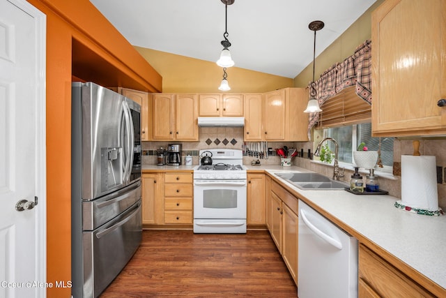 2790 W Versailles Dr, Coeur Dalene, ID 83815 - kitchen with light brown cabinetry, a sink, white appliances, under cabinet range hood, and vaulted ceiling