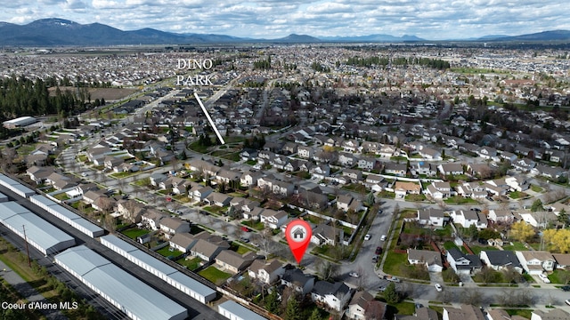 2790 W Versailles Dr, Coeur Dalene, ID 83815 - drone / aerial view featuring a mountain view and a residential view