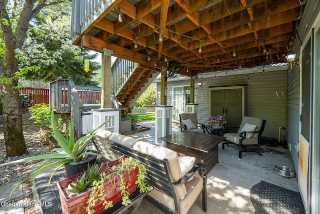 2790 W Versailles Dr, Coeur Dalene, ID 83815 - view of patio with fence, an outdoor living space, and stairs