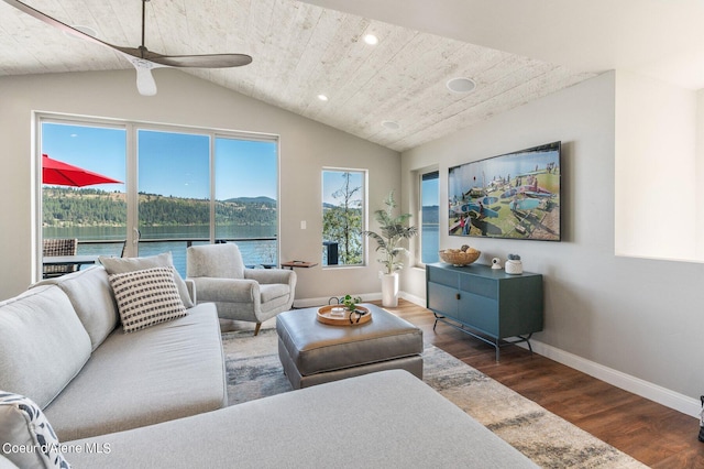 1967 W Cottonwood Rd, Worley, ID 83876 - living room featuring baseboards, vaulted ceiling, recessed lighting, a ceiling fan, and wood finished floors
