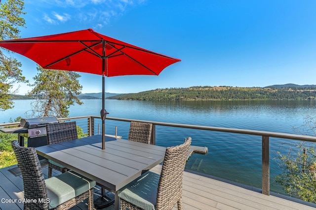 1967 W Cottonwood Rd, Worley, ID 83876 - deck featuring a water view, a grill, and outdoor dining area