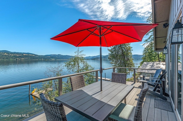 1967 W Cottonwood Rd, Worley, ID 83876 - wooden terrace featuring a water and mountain view and outdoor dining area