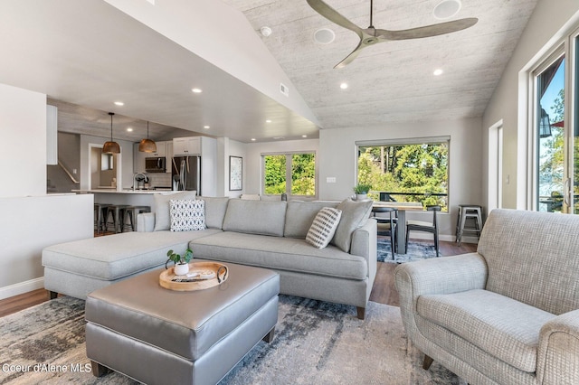 1967 W Cottonwood Rd, Worley, ID 83876 - living room featuring recessed lighting, vaulted ceiling, a ceiling fan, and wood finished floors