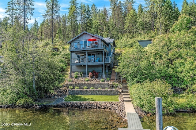 1967 W Cottonwood Rd, Worley, ID 83876 - rear view of house with a water view, metal roof, a standing seam roof, and stairs