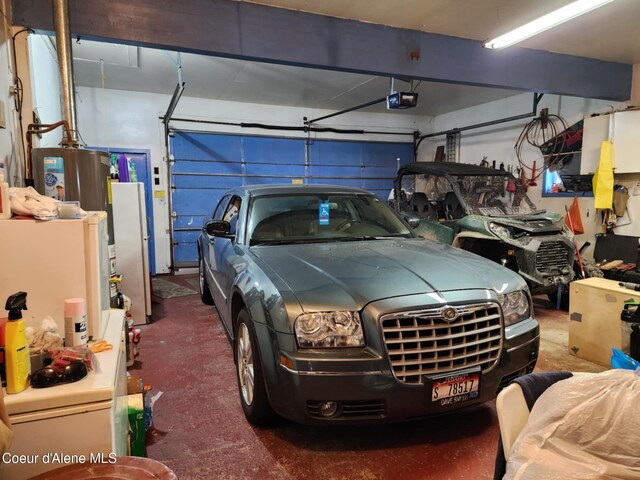 216 W Oak Ave, Osburn, ID 83849 - garage featuring a garage door opener