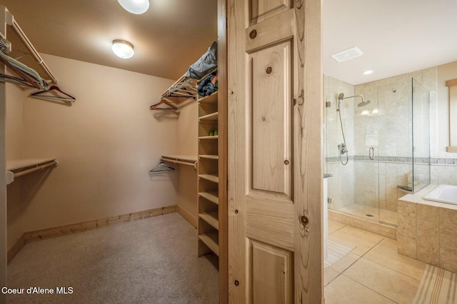 3765 Bottle Bay Rd, Sagle, ID 83860 - walk in closet with light tile patterned flooring