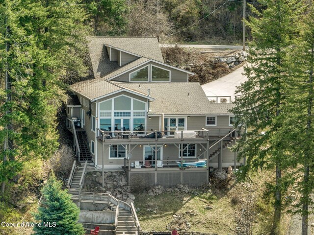 3765 Bottle Bay Rd, Sagle, ID 83860 - back of house with roof with shingles, stairway, and a deck